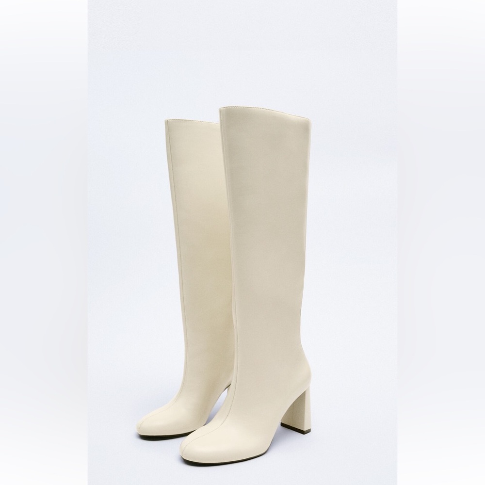 Off white knee high heeled boots